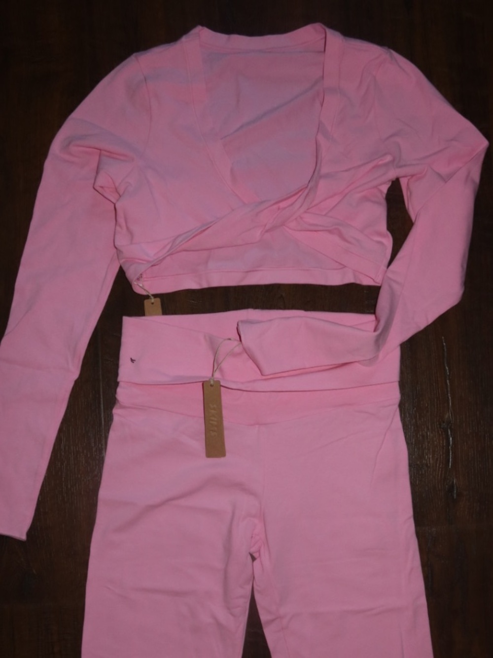 Skims pink crop top and flare pants set